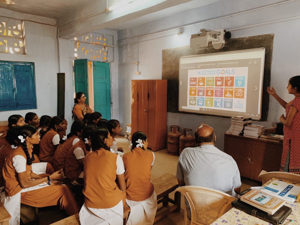 Shiva leading an education session in India